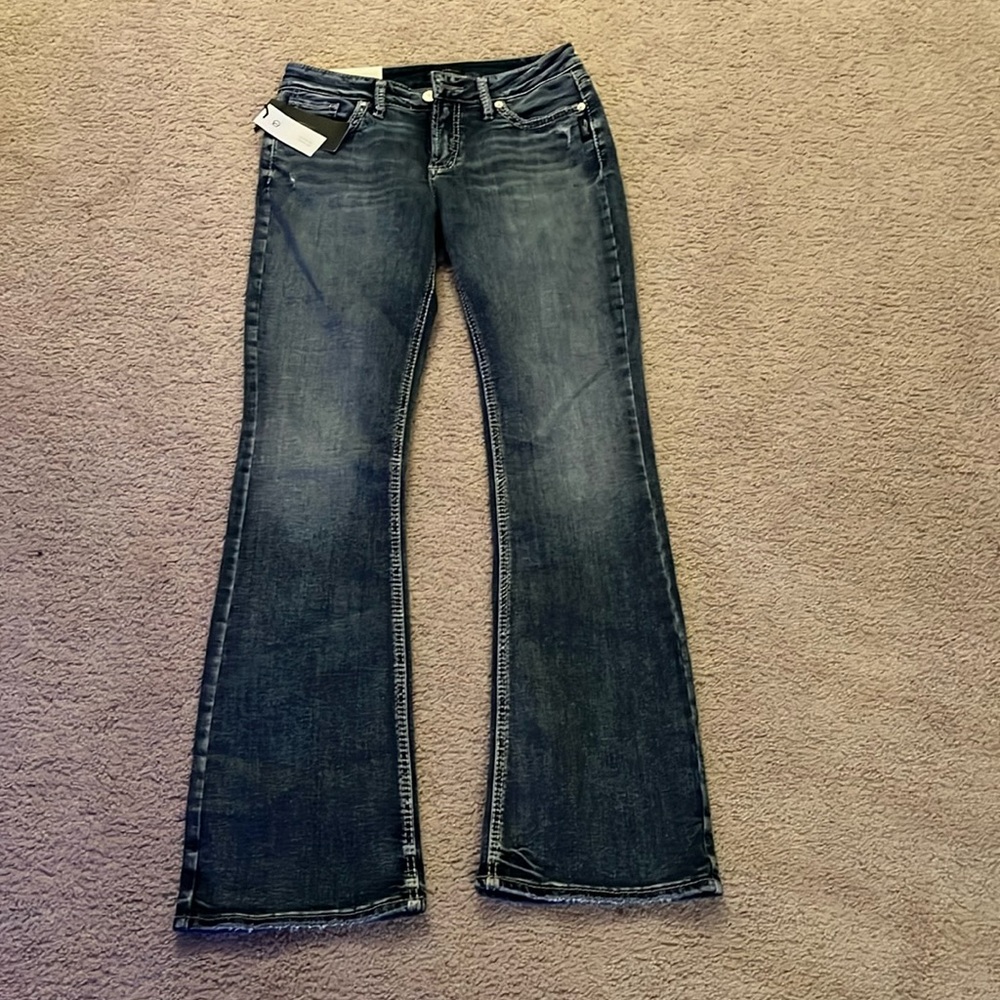 Silver boot cut jeans…new with tags